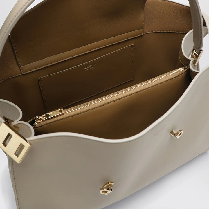 Ferragamo - Ivory and ochre leather Hug Soft L handbag