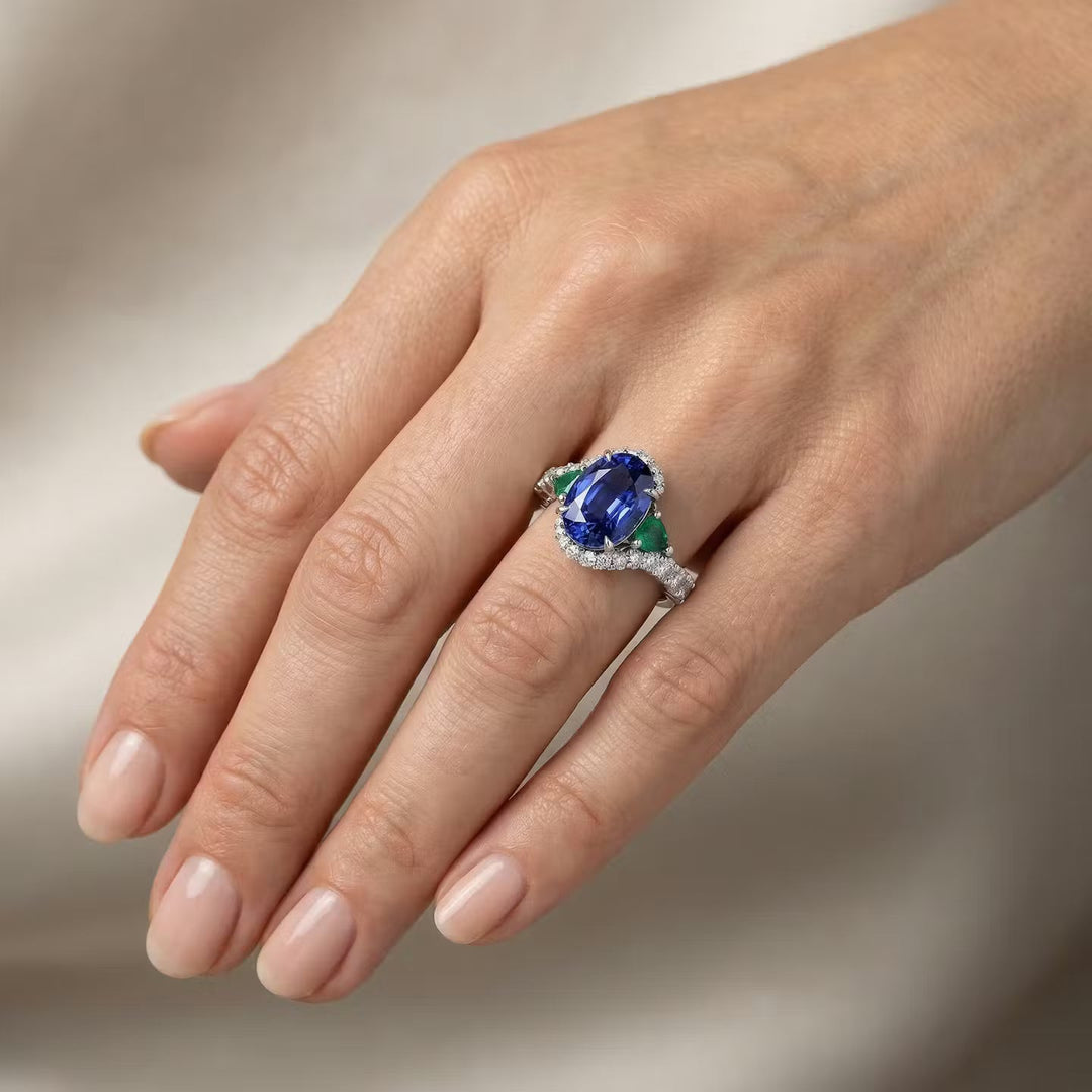 Leibish Royal Blue Oval Sapphire, Pear Emeralds, and Diamond Ring