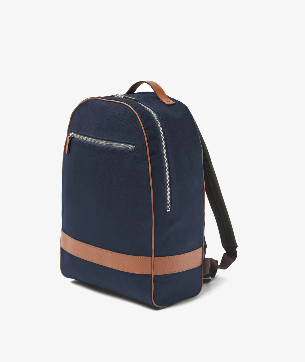 Navy blue backpack with a brown stripe on a white background