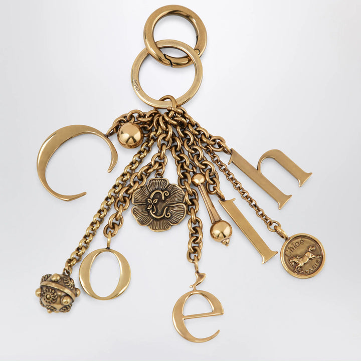 Chloé - Bag charm keyring Symbols Logo in vintage gold brass Brand Apparel &amp; Accessories > Jewelry U