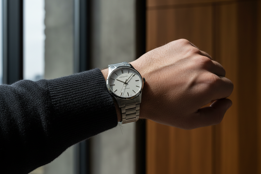 Nordgreen Guardian 40mm Silver Automatic H-Link watch worn on wrist, luxury lifestyle editorial